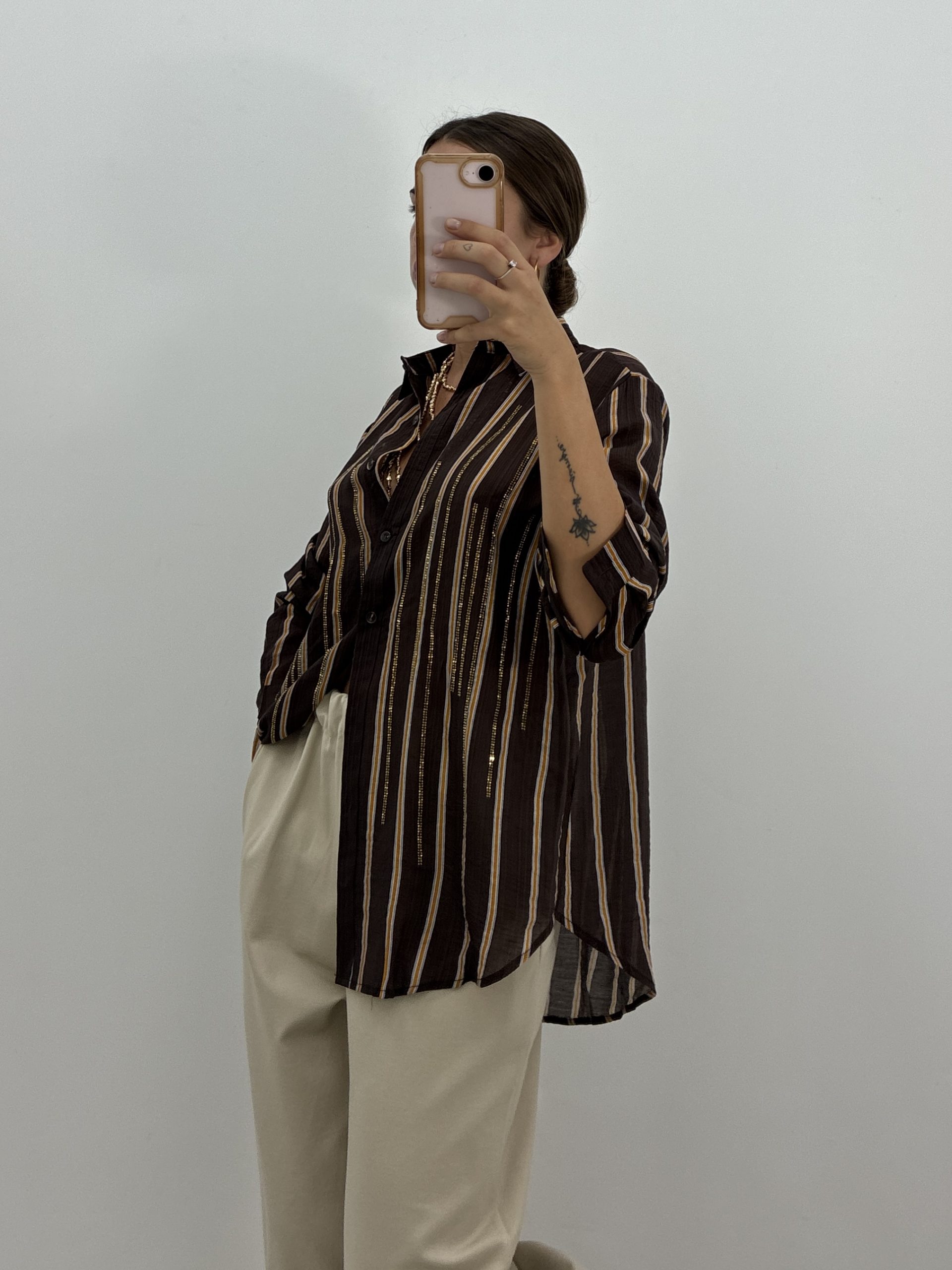 BLUSA RAYAS BRILLO DORADO
